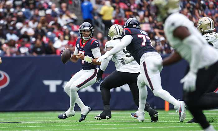 Houston Texans quarterback C.J. Stroud (7) looks for an open receiver during the second quarter against the New Orleans Saints at NRG Stadium.